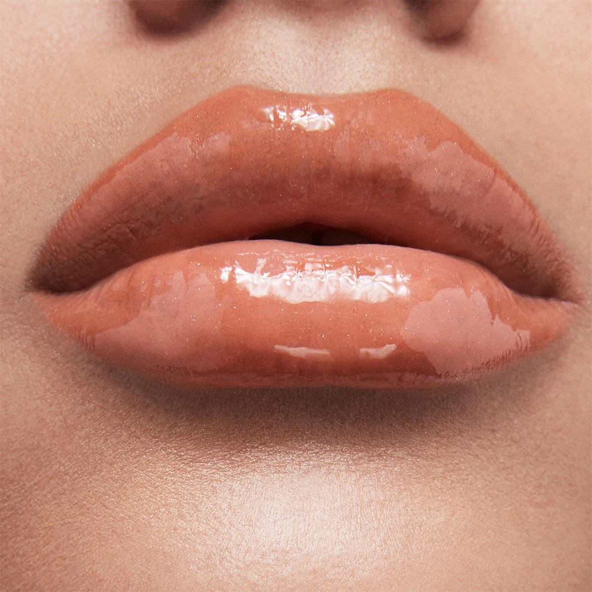 COLLECTION PLUMPING LIP GLAZE (VOLUMINIZADOR DE LABIOS)
