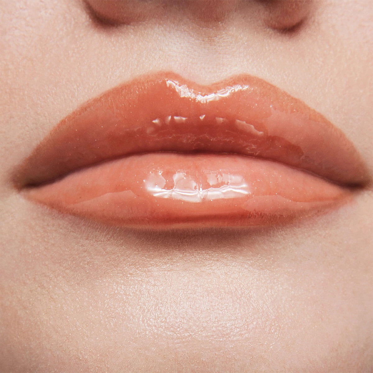 COLLECTION PLUMPING LIP GLAZE (VOLUMINIZADOR DE LABIOS)