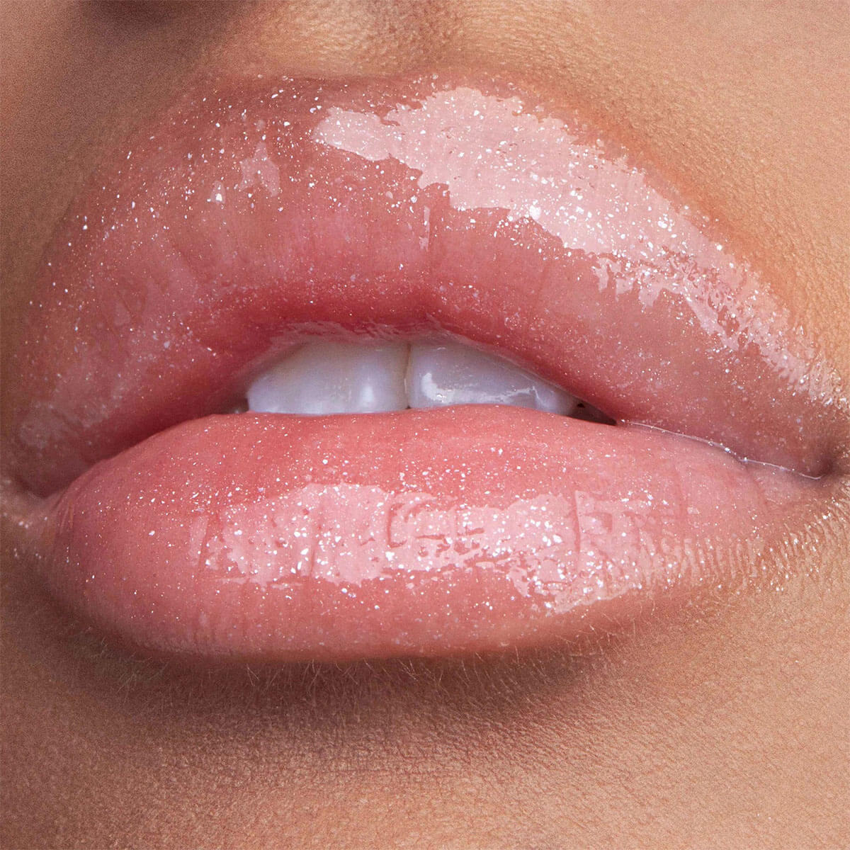 COLLECTION PLUMPING LIP GLAZE (VOLUMINIZADOR DE LABIOS)